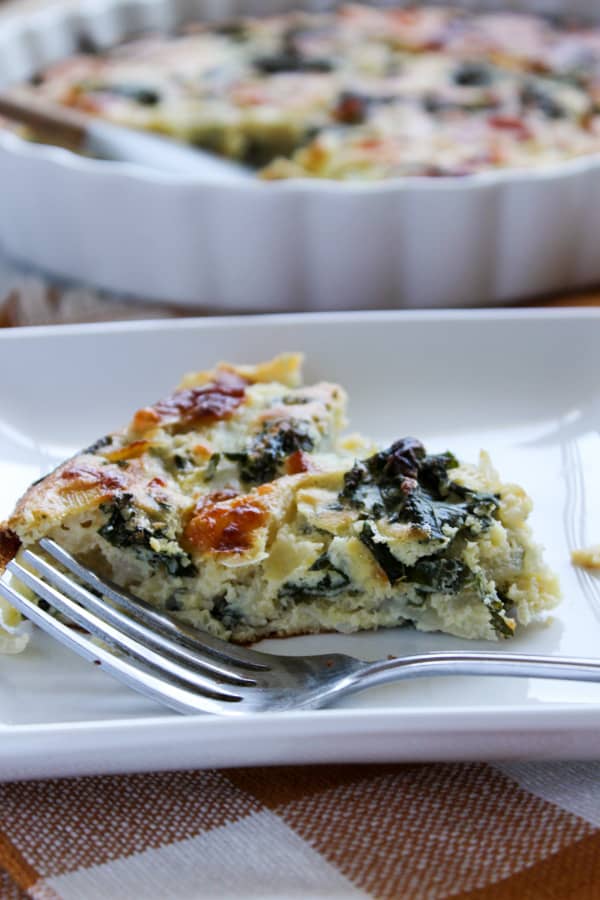 Crustless Kale Pie. You will love this as a make-ahead meal for any time of day! It has all the goods: protein, greens, and loads of flavor from caramelized onions, feta, and chickpea flour. YUM. Perfect for holiday brunch this season if you have visitors, or for a healthy brunch at any time of year. www.rootsandradishes.com