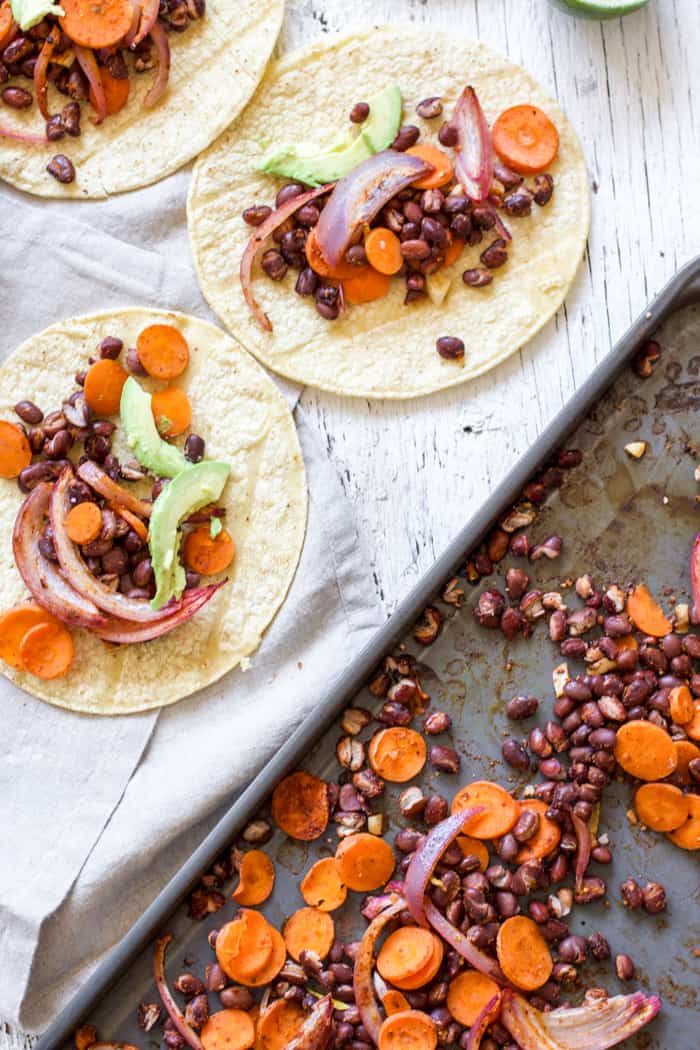 Sheet pan black bean tacos with carrots and lime