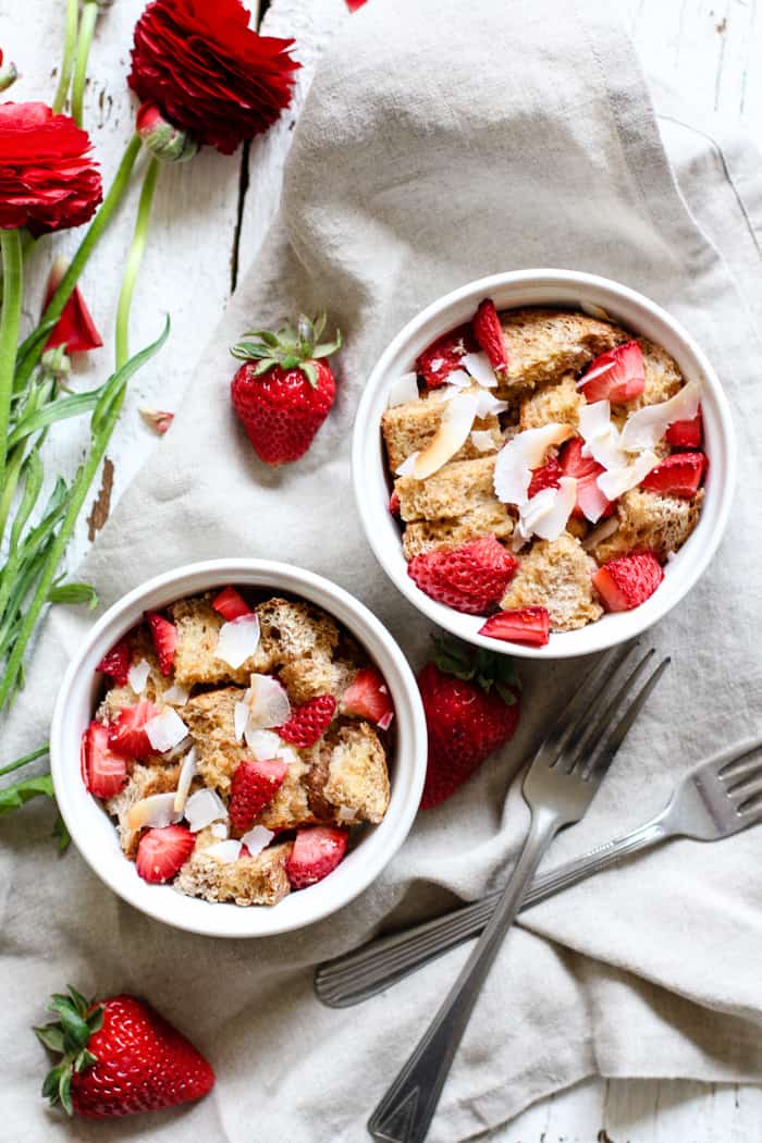 Strawberry Coconut French Toast Bakes for Two - So easy and yummy! And perfect for those lazy Saturdays and Sundays. Sprouted grain bread, fresh strawberries, and coconut flakes. Share with a friend or significant other! | rootsandradishes.com