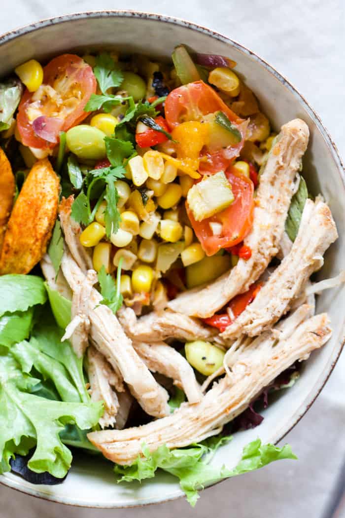 Summery Pulled Pork and Veggie Bowls - OMG these bowls embody summer at its finest! Smokey and spicy pulled pork, sautéed summer veggies, and roasted sweet potatoes, all combined in a big ol' bowl. So flavorful! | rootsandradishes.com
