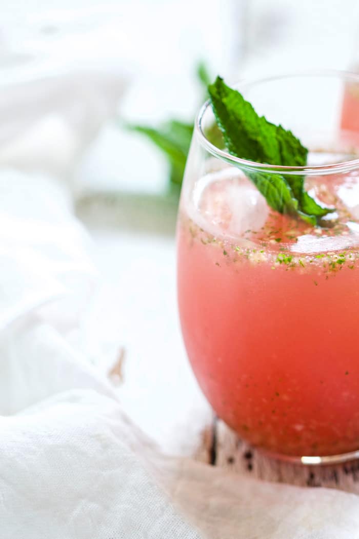 Watermelon Ginger Agua Fresca - SO refreshing and delicious, perfect for cooling down on a hot summer day. Watermelon, ginger, mint, lime, agave - blend it all up with water, chill, and serve. | rootsandradishes.com