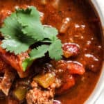 Bowl of classic beef chili with cilantro garnish