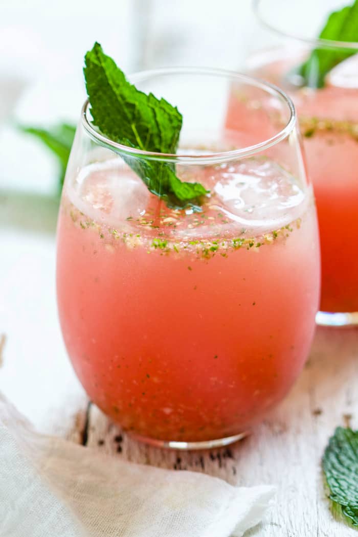 Watermelon Ginger Agua Fresca - SO refreshing and delicious, perfect for cooling down on a hot summer day. Watermelon, ginger, mint, lime, agave - blend it all up with water, chill, and serve. | rootsandradishes.com