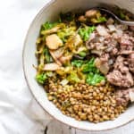 Bowl with rosemary oil beef and lentils