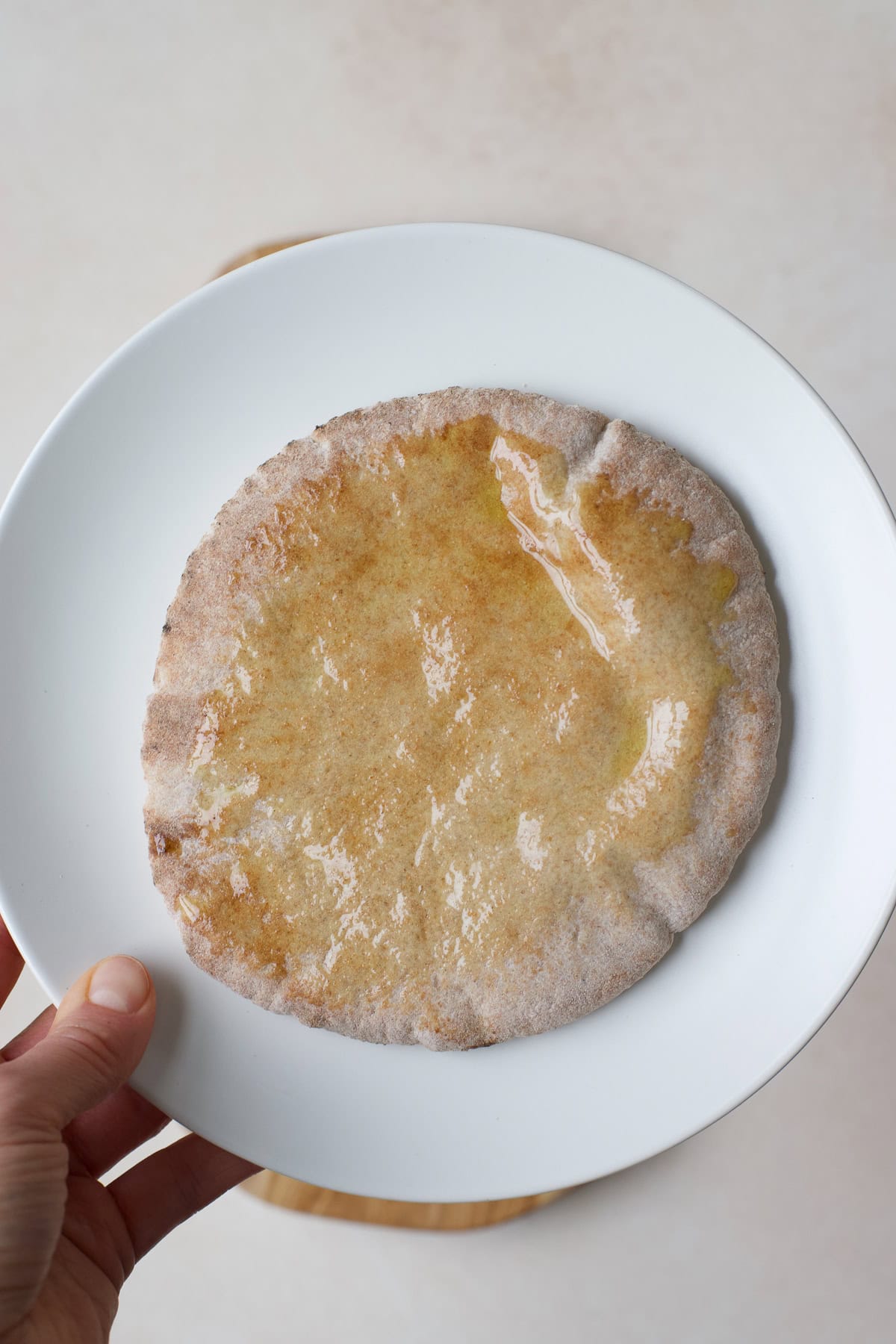 Pita bread brushed with olive oil.