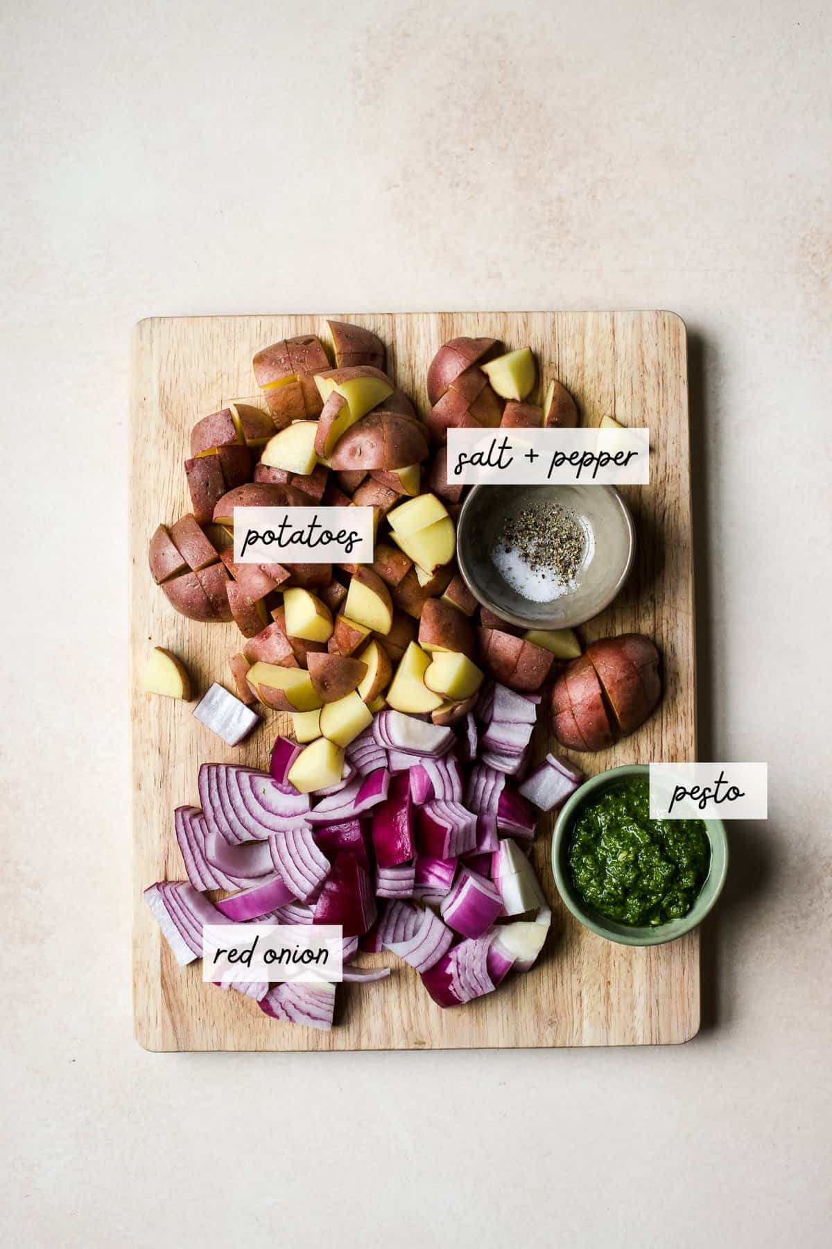 Ingredients needed to make pesto roasted potatoes.