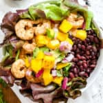 Chili lime shrimp and black beans with mango salsa