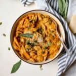 Homemade pumpkin pasta in bowl.