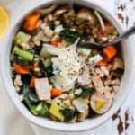 Bowl of lemony chicken sausage and farro soup