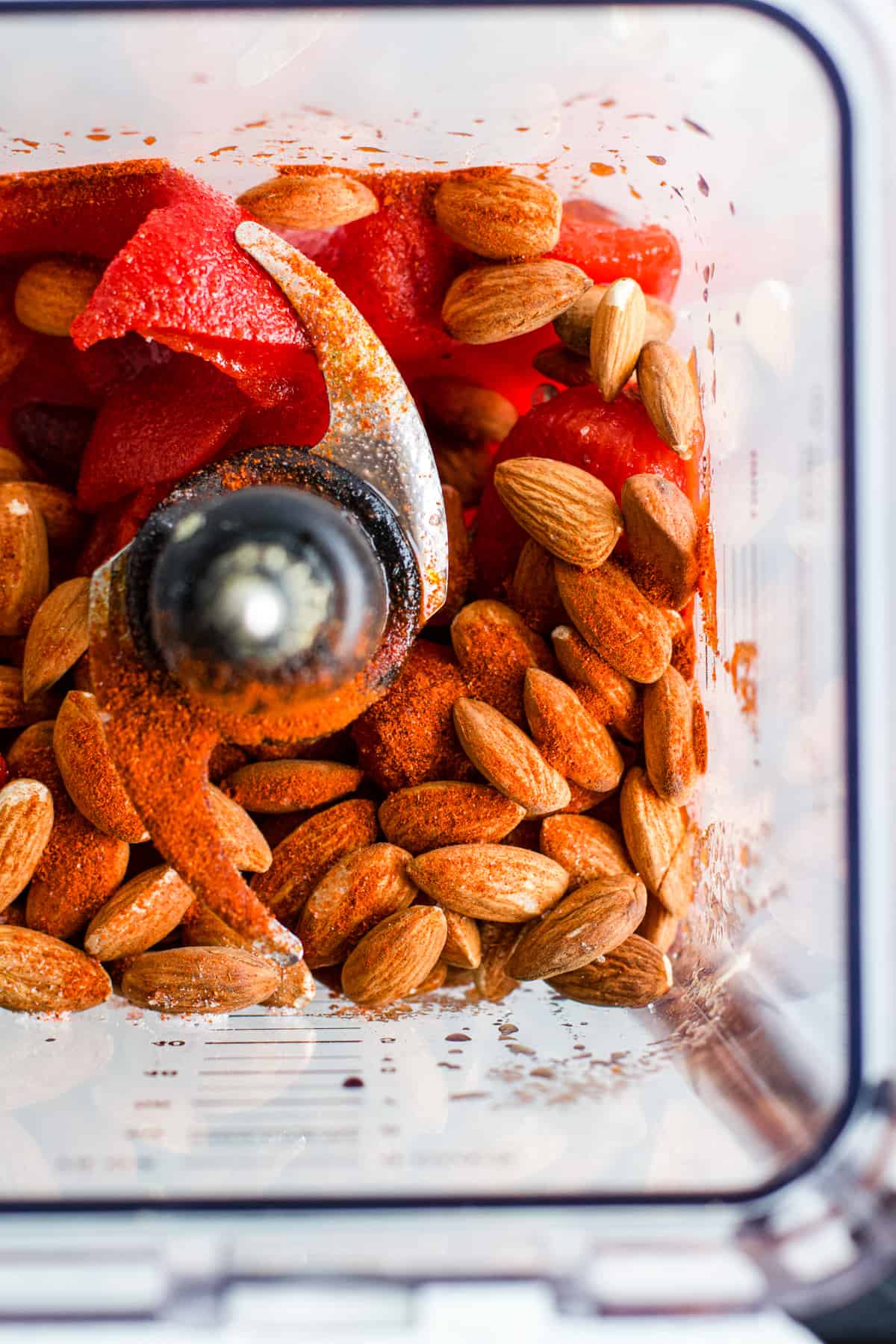 Almonds, roasted red peppers, tomatoes, smoked paprika, olive oil, vinegar, and salt in high-speed blender