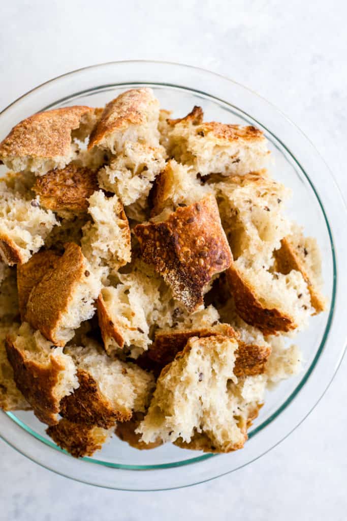 Sourdough bread cubes in clear bowl