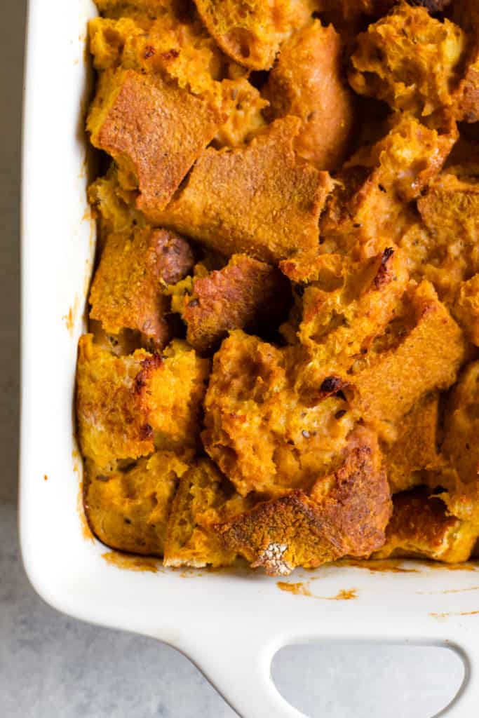 Pumpkin pie French toast bake in white baking dish