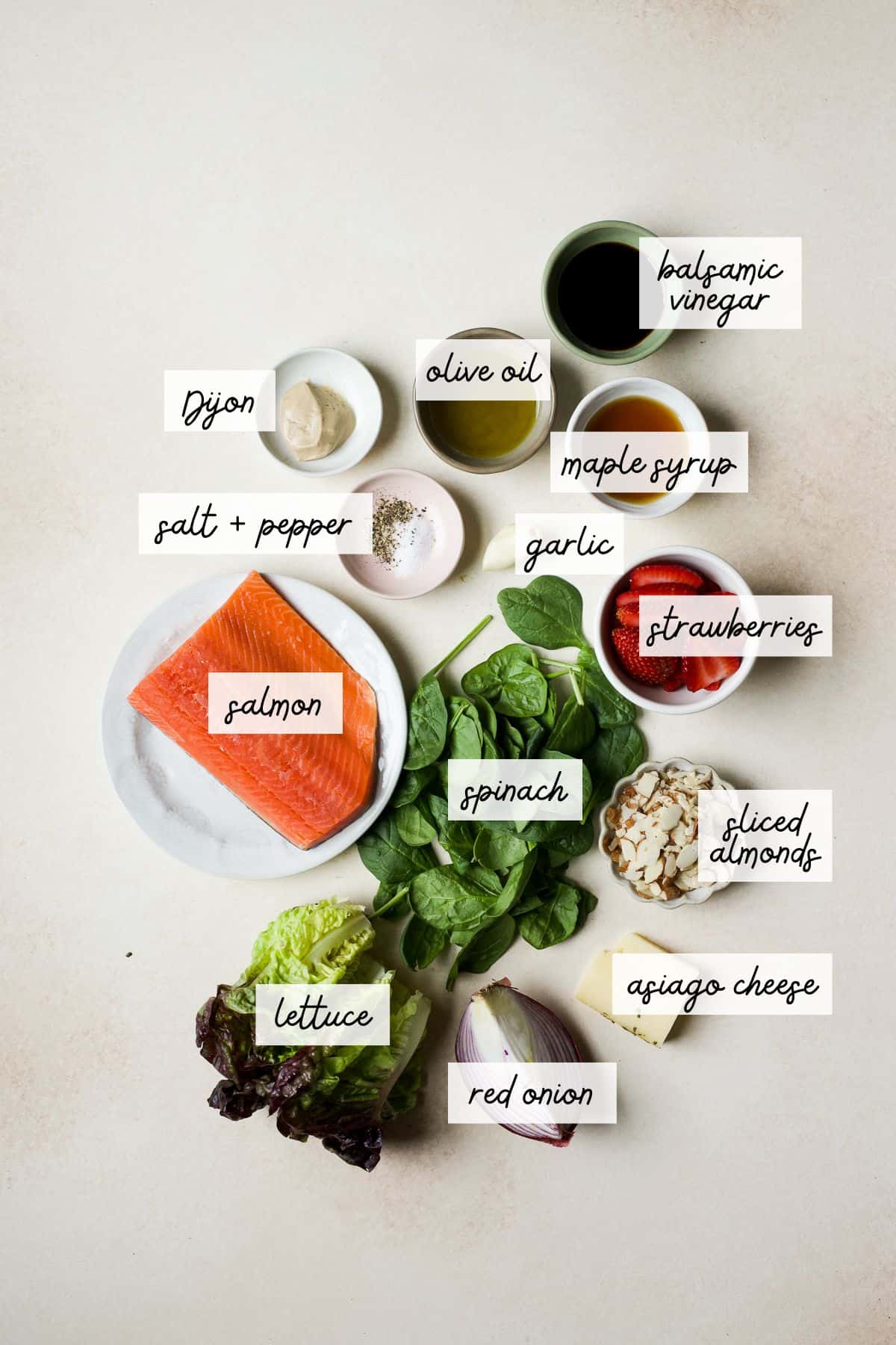 Ingredients needed to make strawberry salad with salmon.