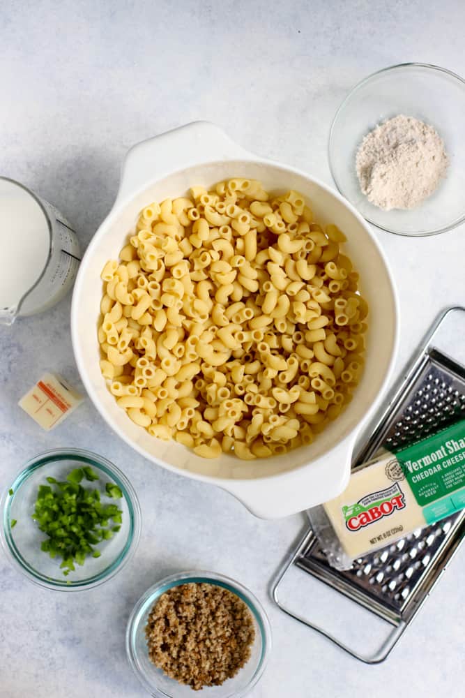 Healthy mac and cheese bite ingredients laid out on table