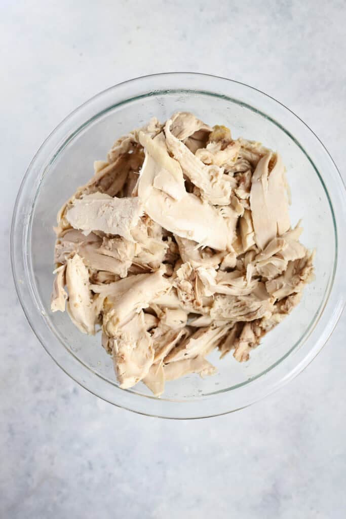 Shredded chicken in a bowl.