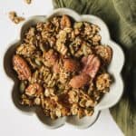 Pumpkin spice granola in a small bowl.