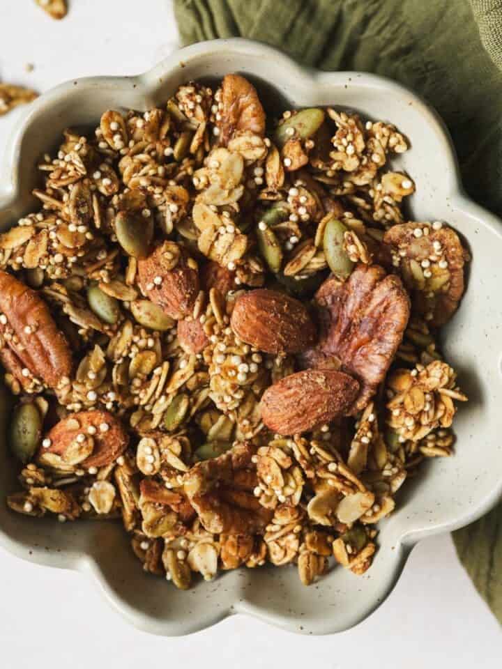 Pumpkin spice granola in a small bowl.