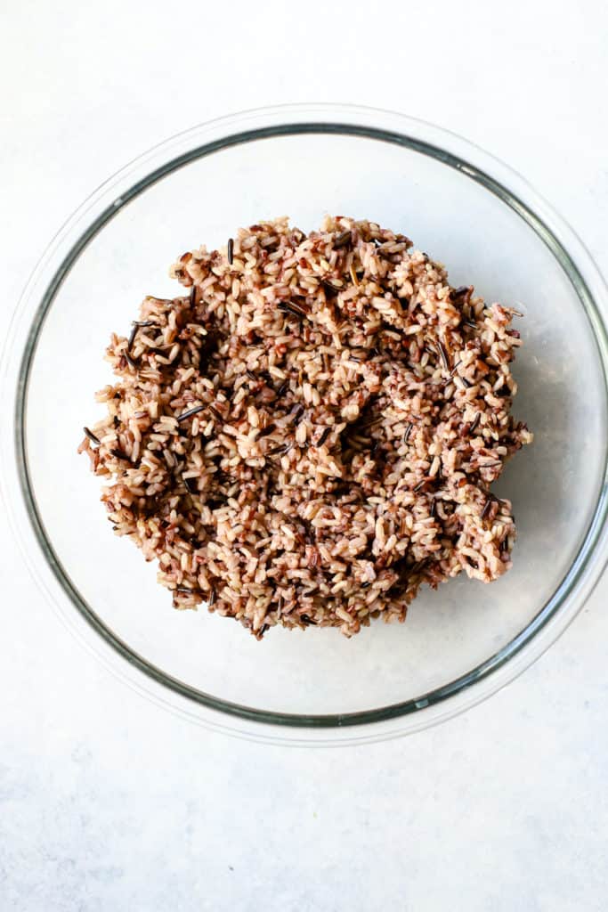 Cooked wild rice blend in glass bowl