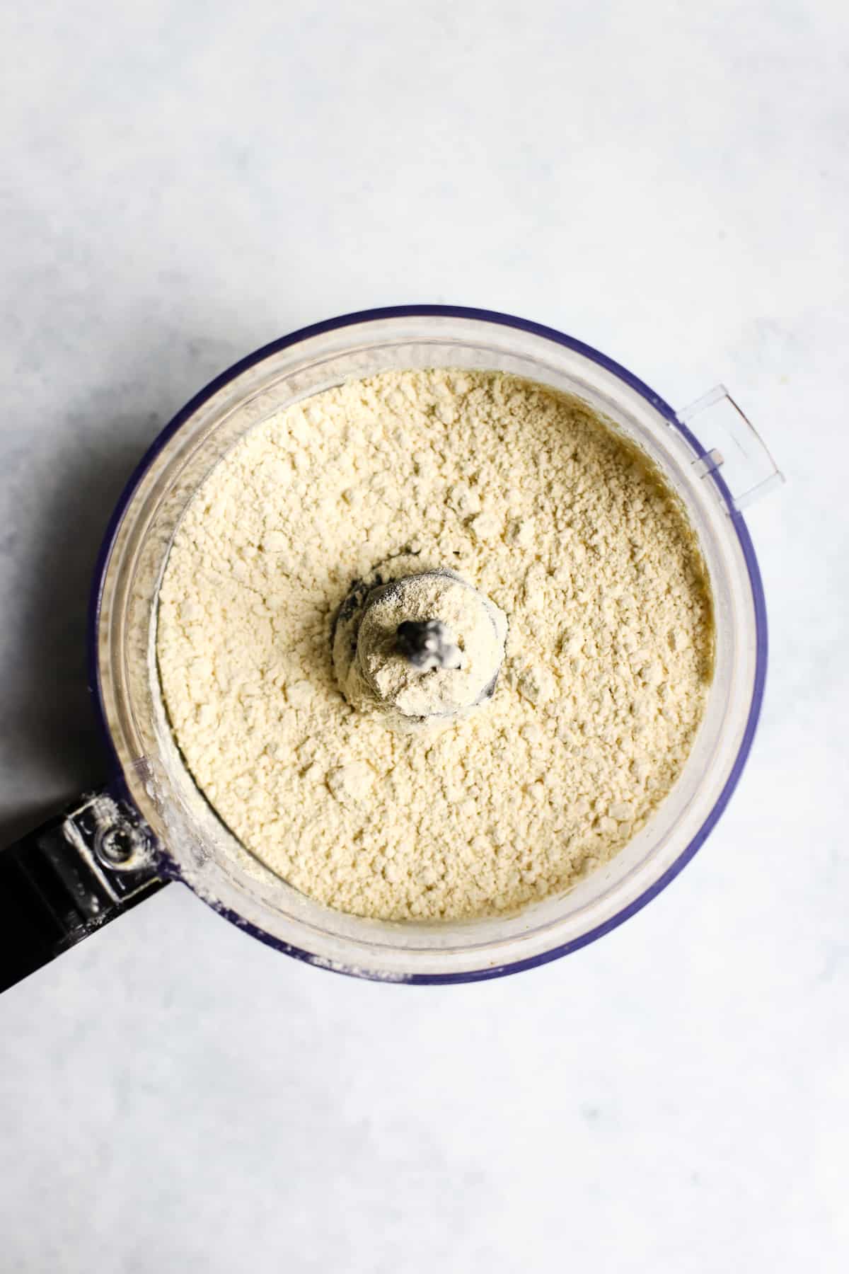 Chickpea flour, salt, and sugar pulsed in food processor.