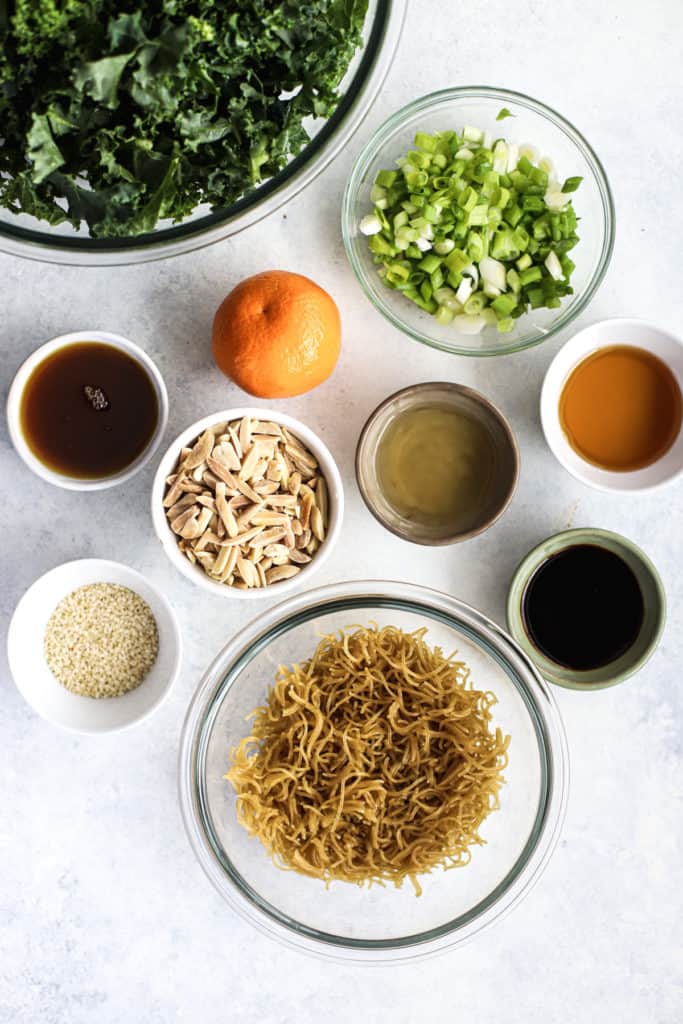 Healthy Asian slaw with ramen ingredients on light blue and white surface