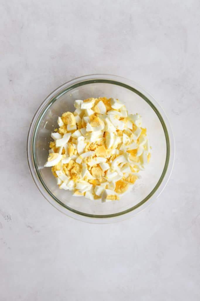 Chopped hard-boiled eggs in a bowl.