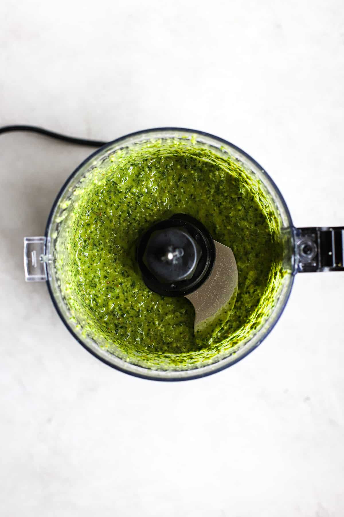 Parsley walnut pesto blended together in food processor