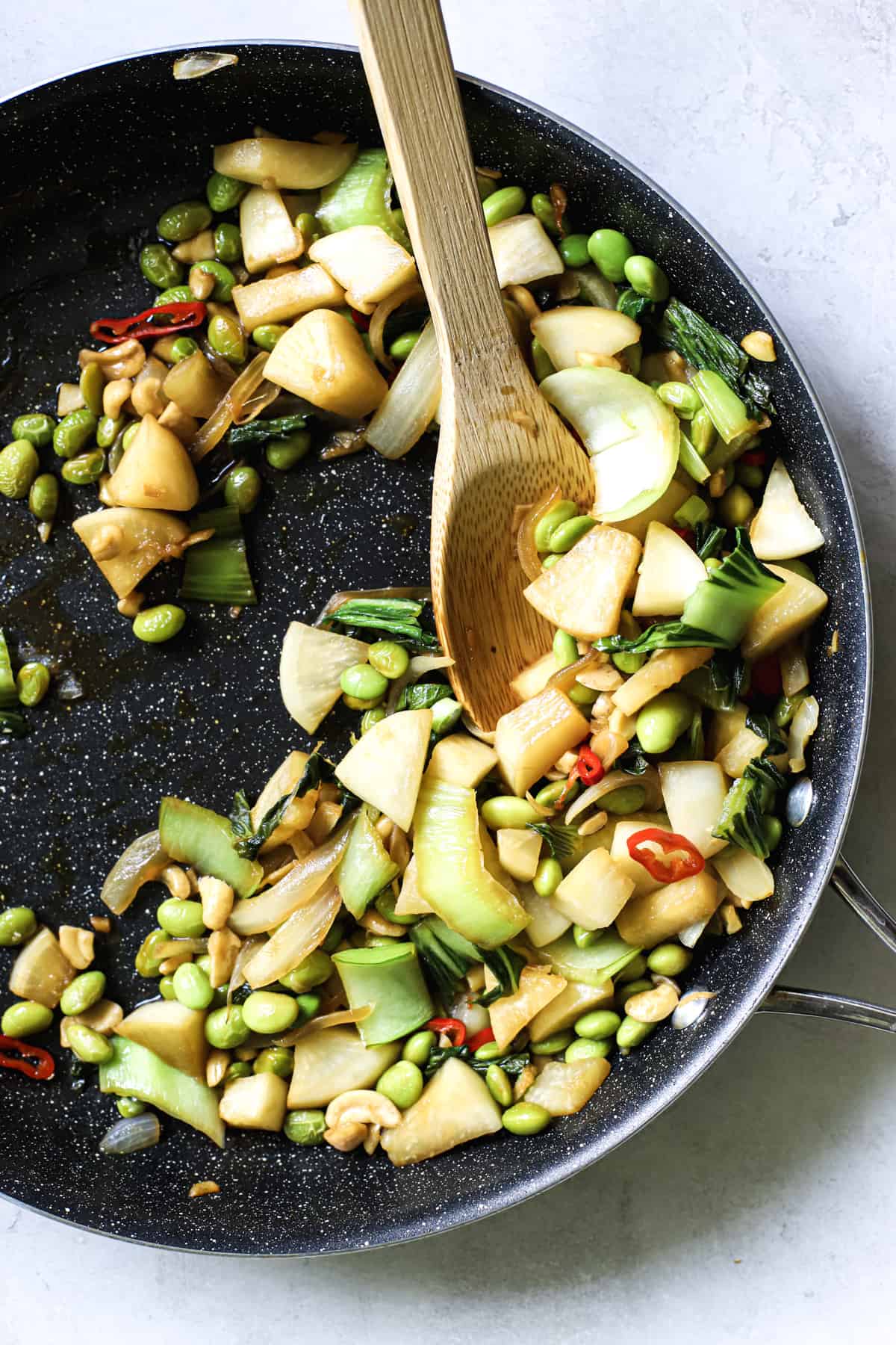 Pad pak in sauté pan with simple Thai stir fry sauce