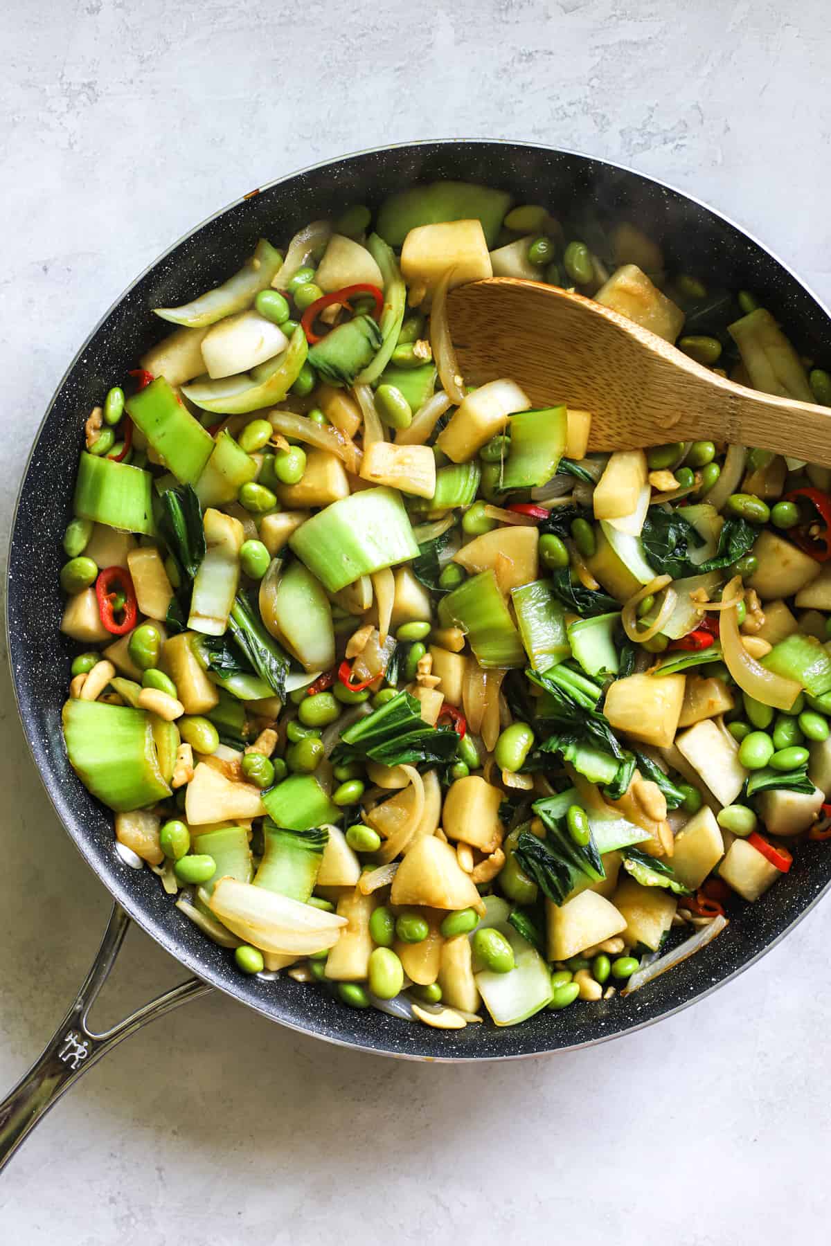 Pad pak in sauté pan with simple Thai stir fry sauce