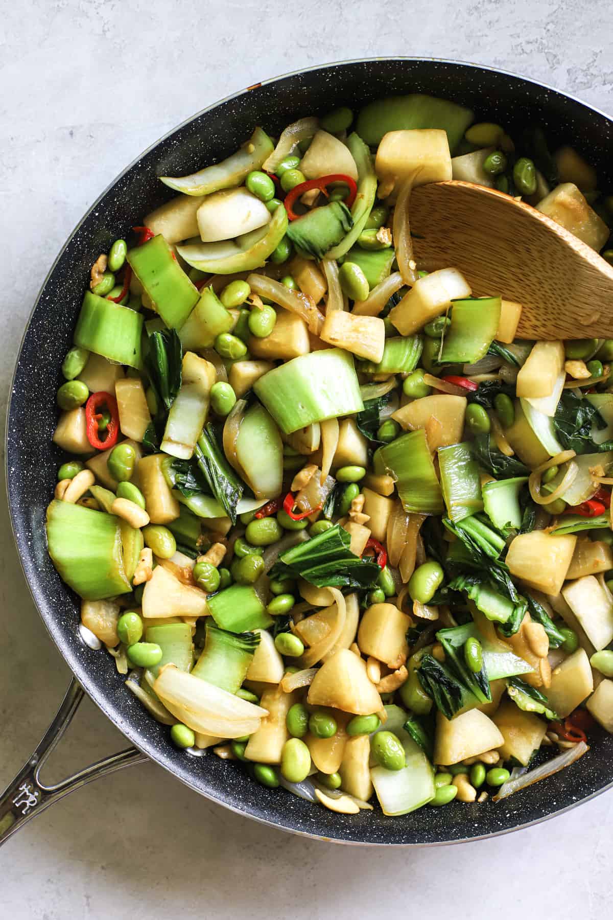 Pad pak in sauté pan with simple Thai stir fry sauce