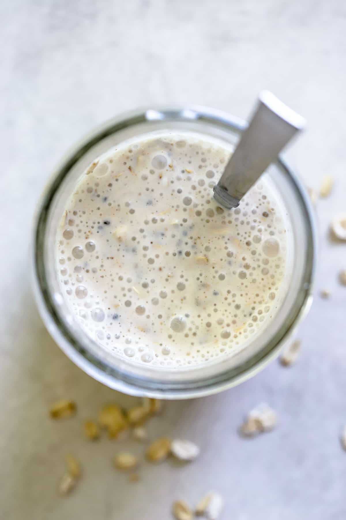 Overnight oats mixture stirred together in a widemouth Mason jar, to be stored in the fridge for at least 30 minutes