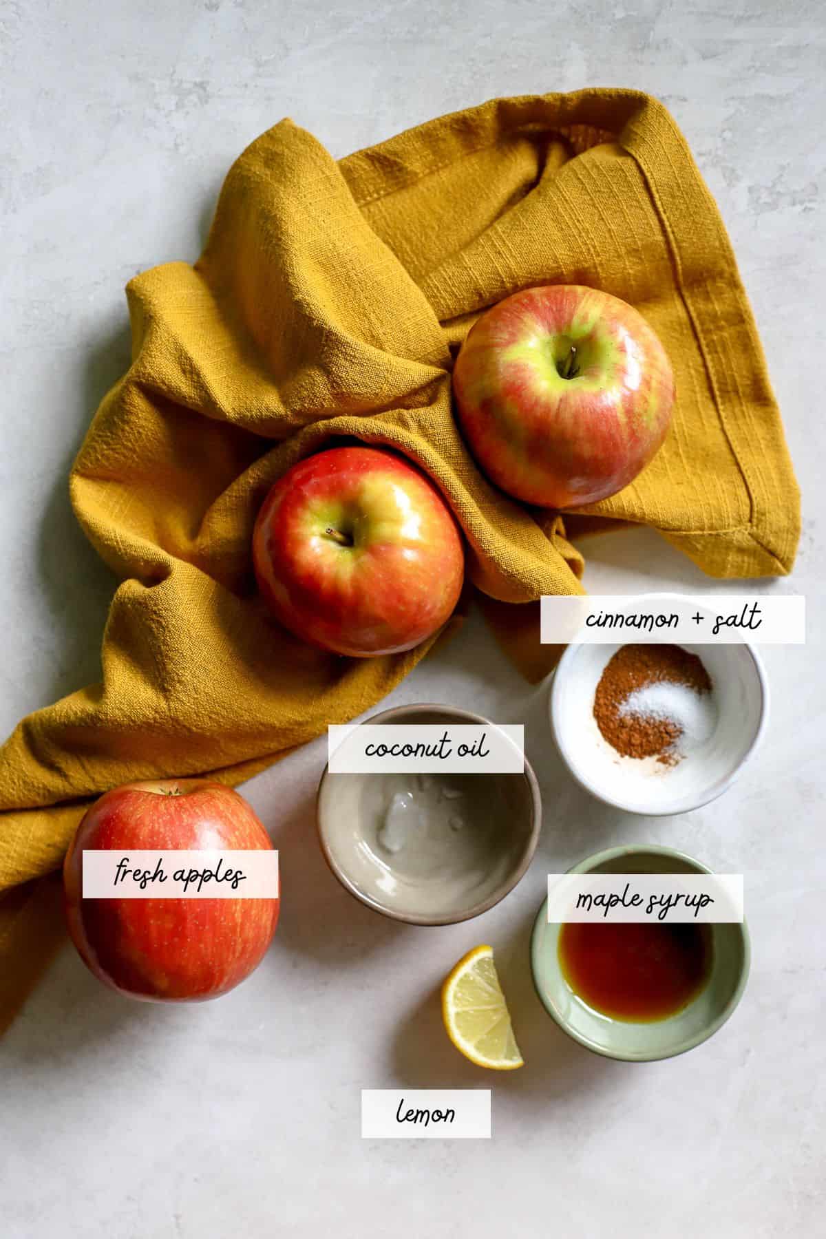 Fresh apples, coconut oil, cinnamon, salt, maple syrup, and lemon.