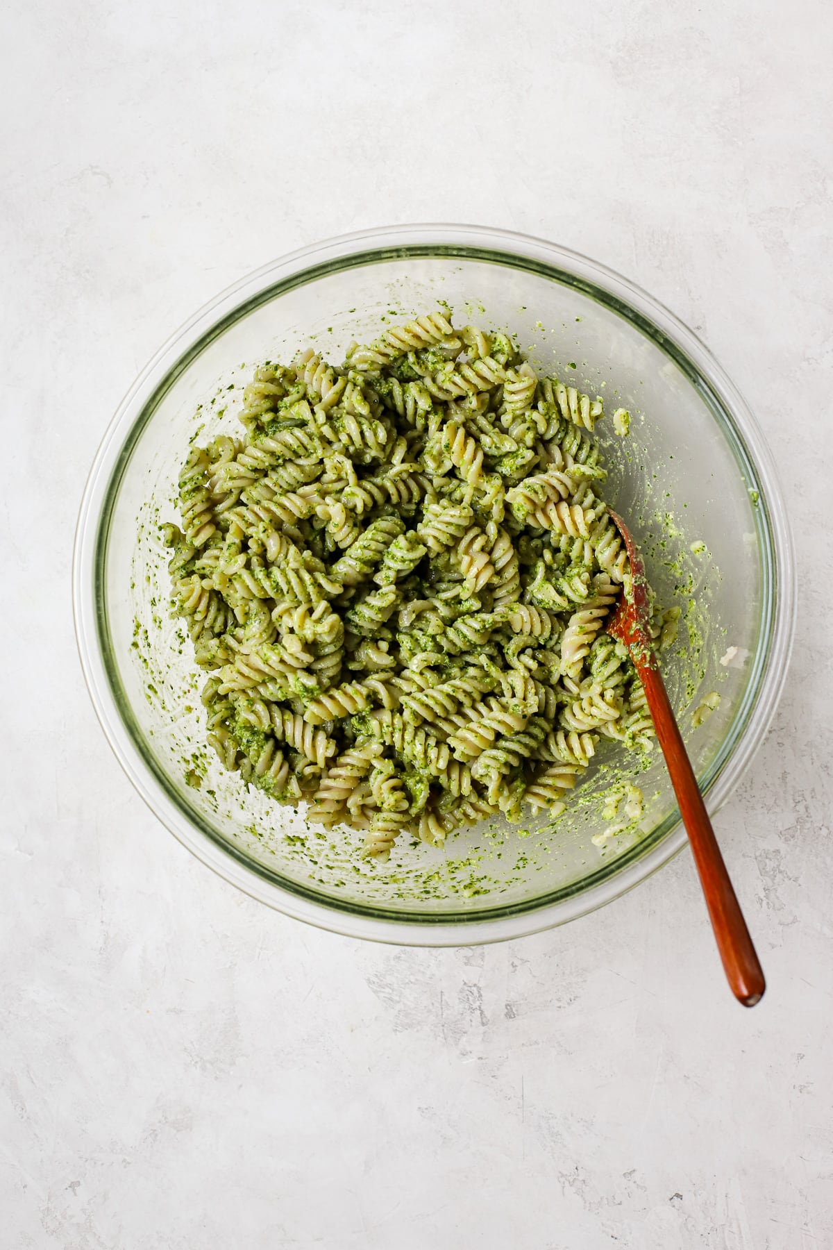 Rotini pasta tossed in fresh pesto.