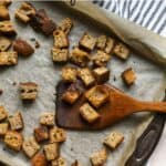 Homemade sourdough croutons on sheet pan.