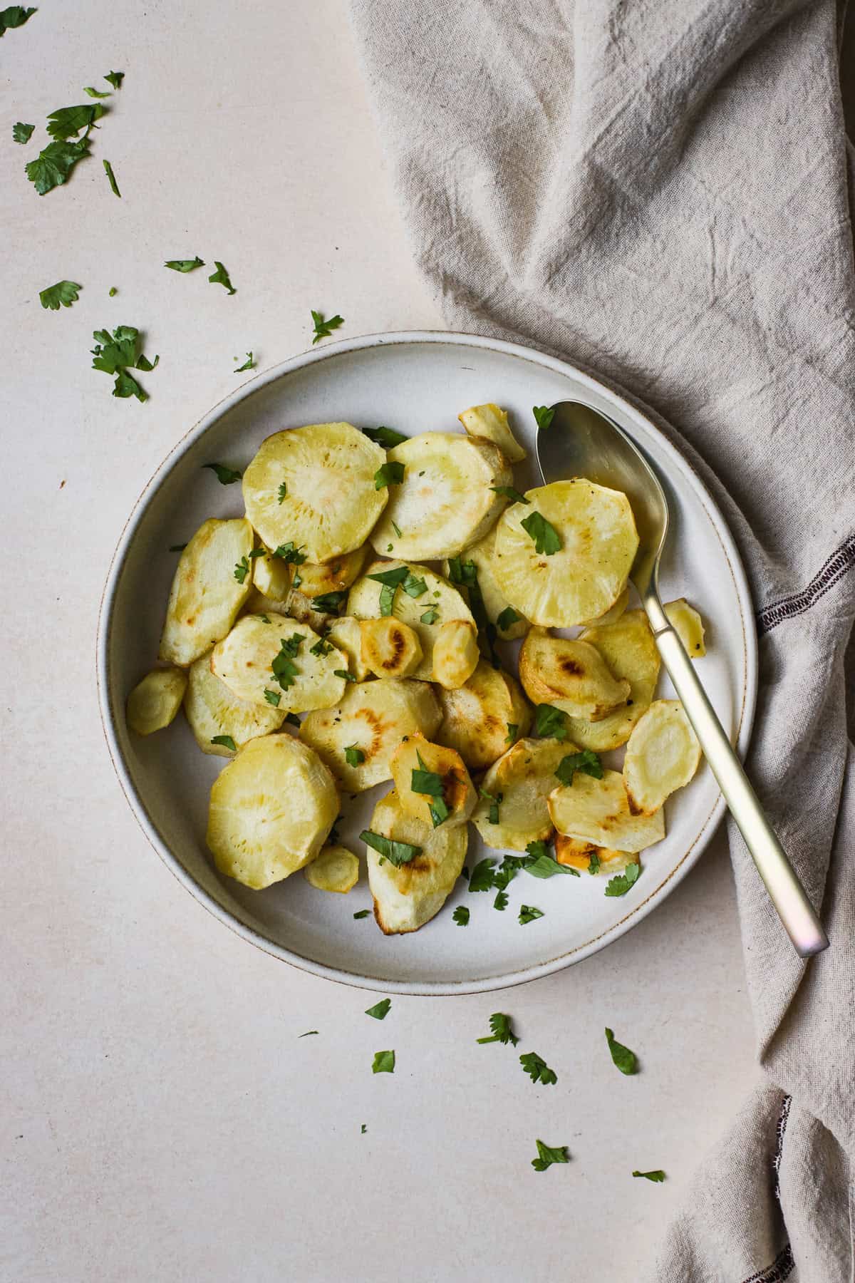 Honey roasted parsnips with a sprinkle of finely chopped cilantro.