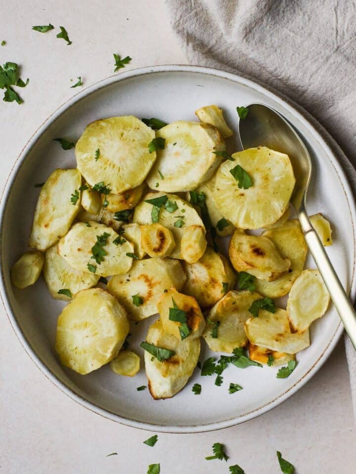 Honey roasted parsnips with a sprinkle of finely chopped cilantro.