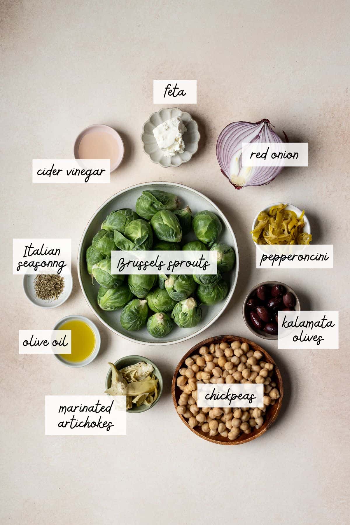 Ingredients needed to make an Italian chopped Brussels sprouts salad.