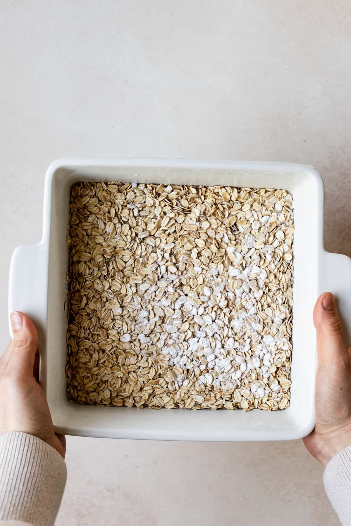 Dry oats, baking power, and salt in baking dish.