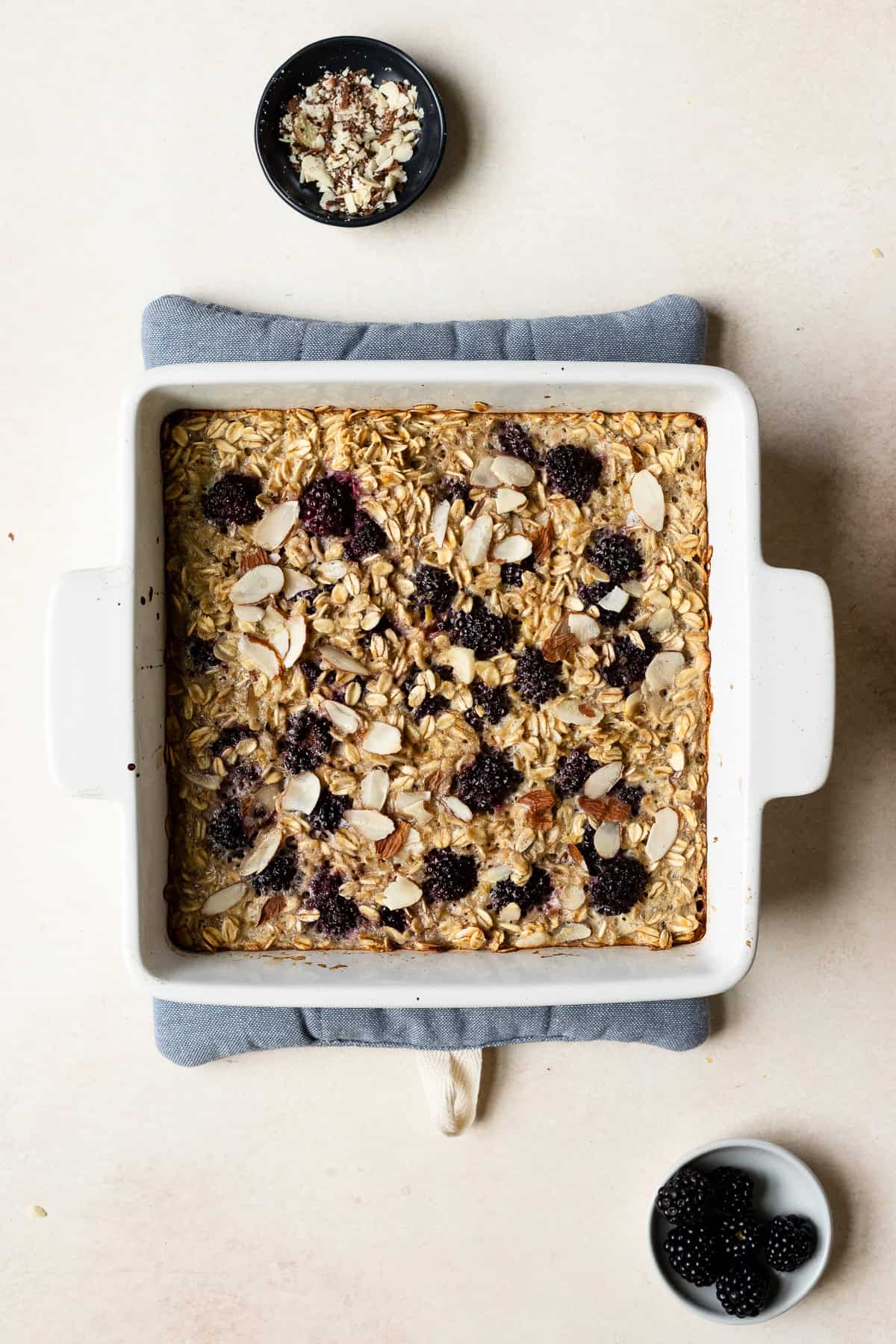 Blackberry oatmeal bake in square baking dish.