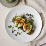 Jammy egg on avocado toast with matcha tea.