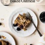 Slice of blackberry baked oatmeal on small plate with fork.