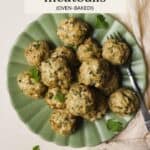 Herby baked chicken meatballs on plate.