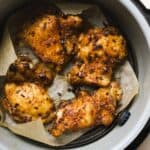 Air fryer chicken thighs with taco spices and hot honey in Ninja Foodi air fryer.