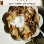 Easy apple pear crisp with oats and cinnamon, served warm in a small bowl with a scoop of vanilla ice cream.