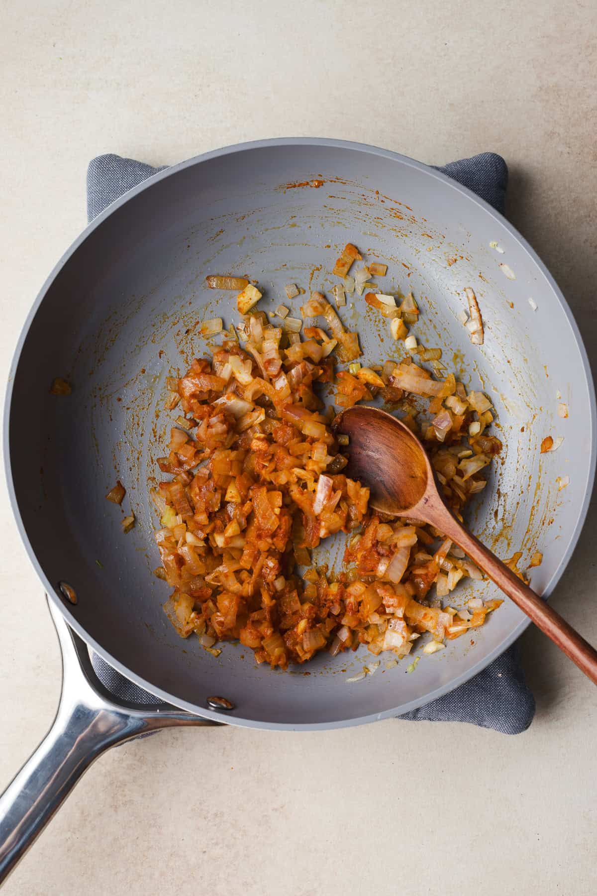 Sautéing aromatics for a creamy, Thai-style curry with canned pumpkin.