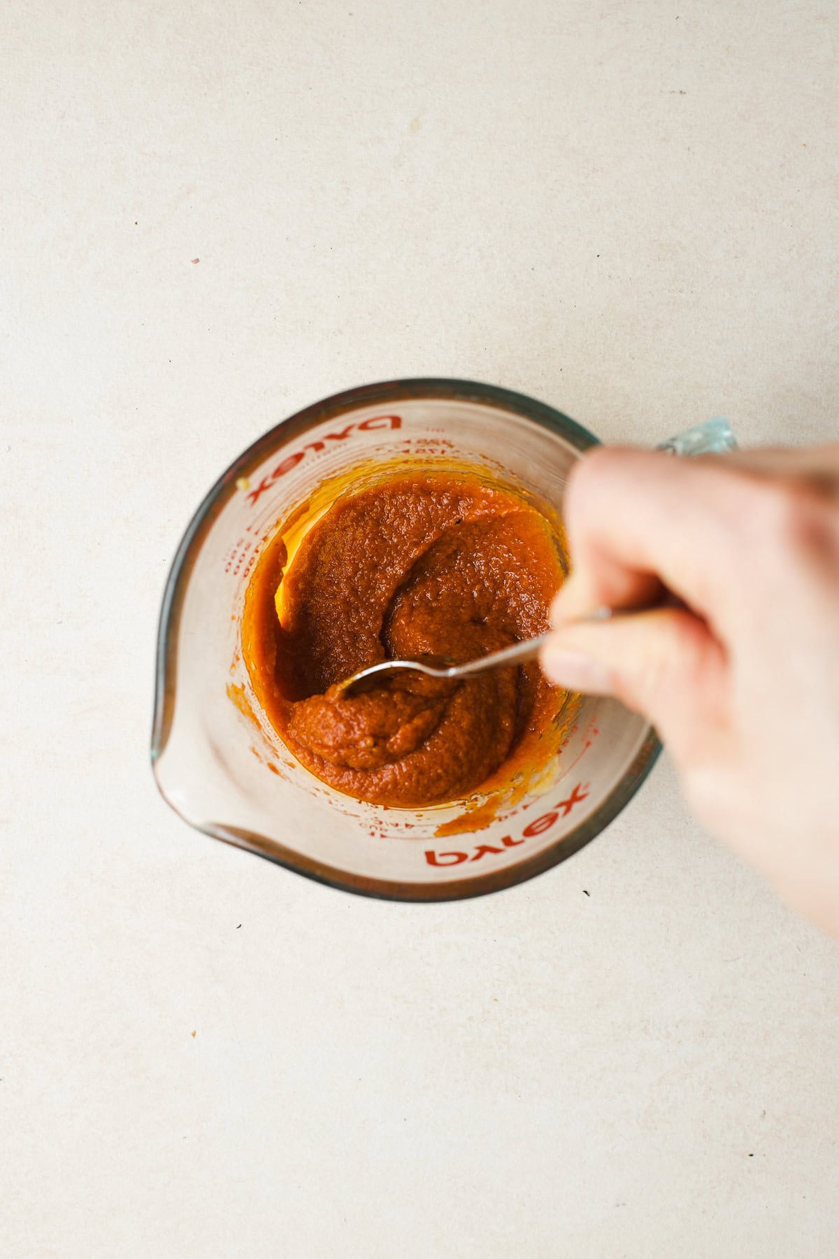 Whisking the miso curry sauce together.