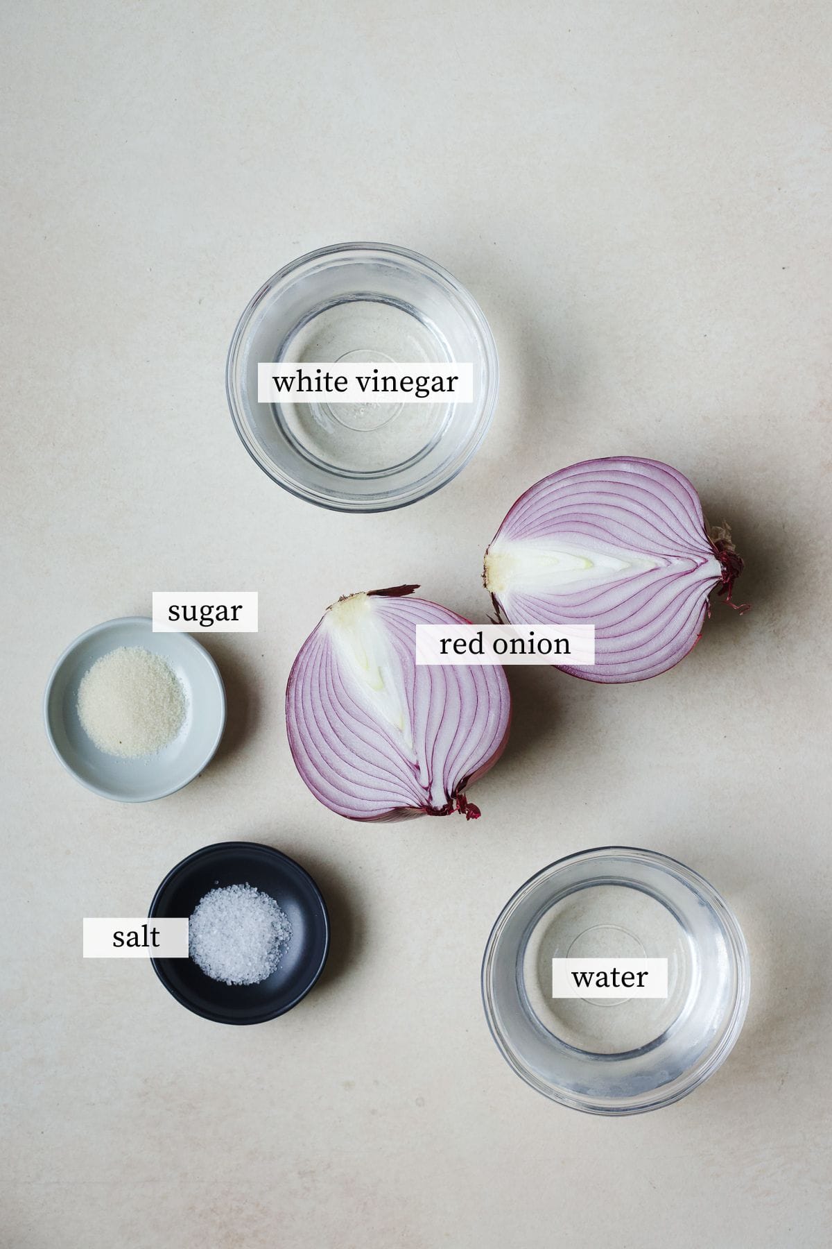 Ingredients needed for quick pickled red onions.
