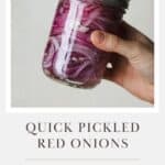 Hand shaking a jar to mix pickled red onion ingredients.