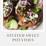 Three smoky black bean stuffed sweet potatoes with toppings on a plate.