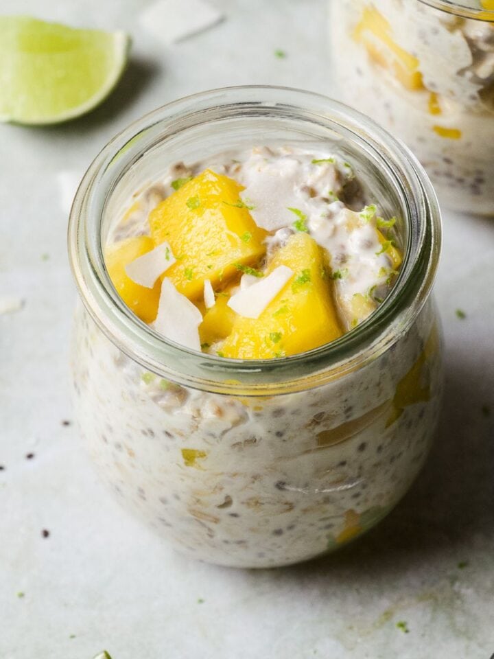 Mango overnight oats with coconut and lime in a jar.