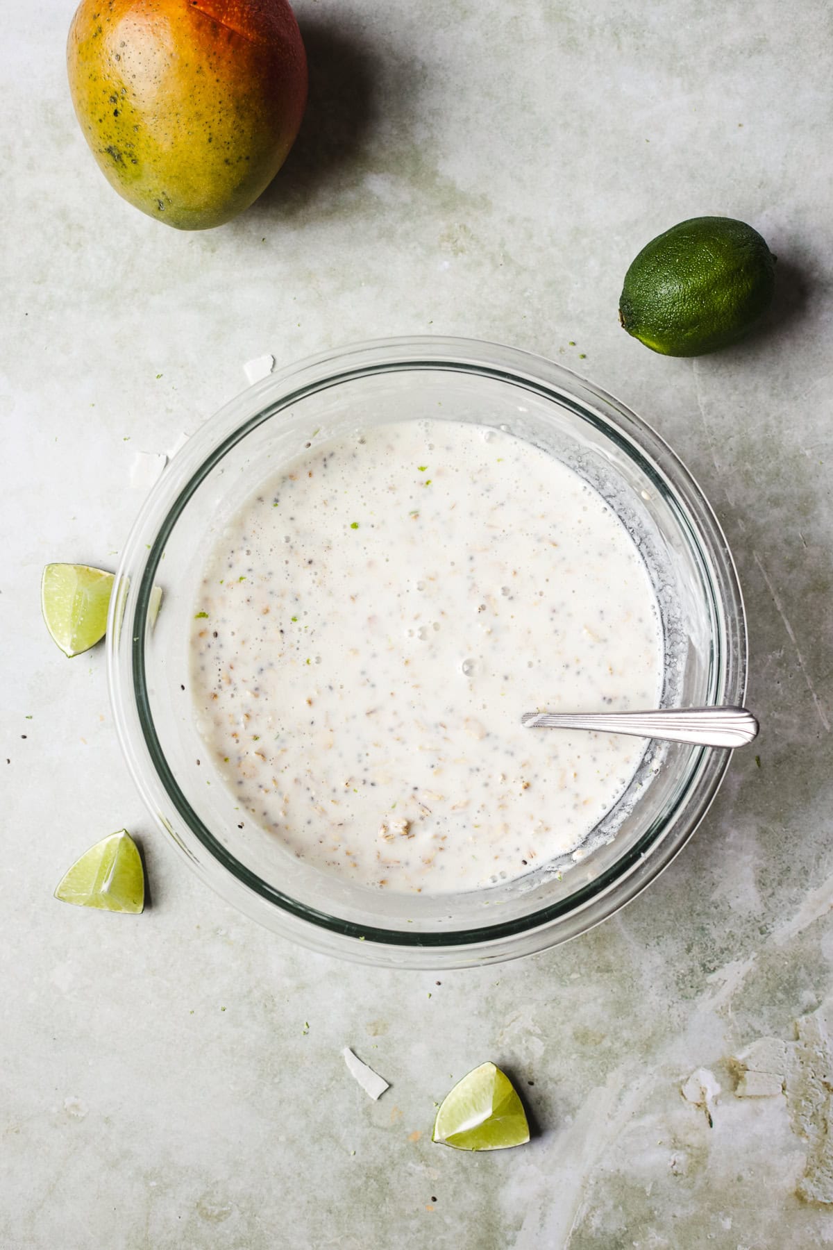 Mixing all overnight oats ingredients together in a bowl.